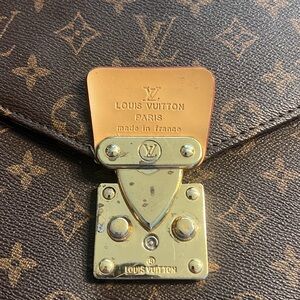 LV unique clutch. With key! The handle could easily be replaced by a cobbler/LV